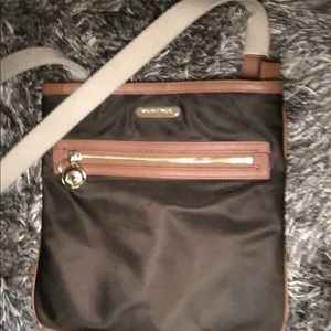 Brown Michael Kors purse w/ gold embellishment
